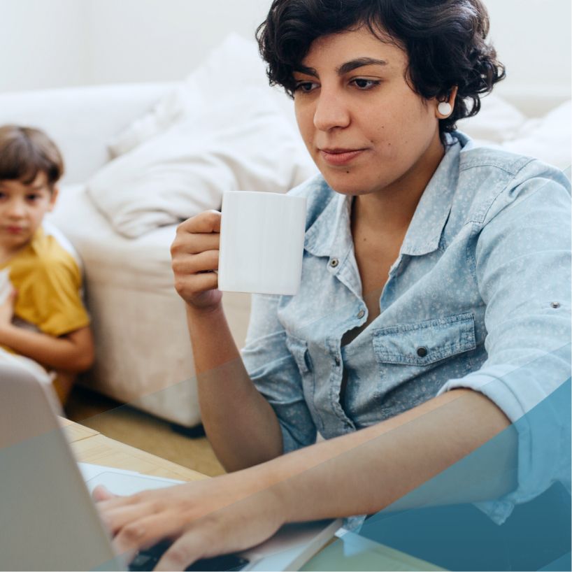 mother works at home with her son