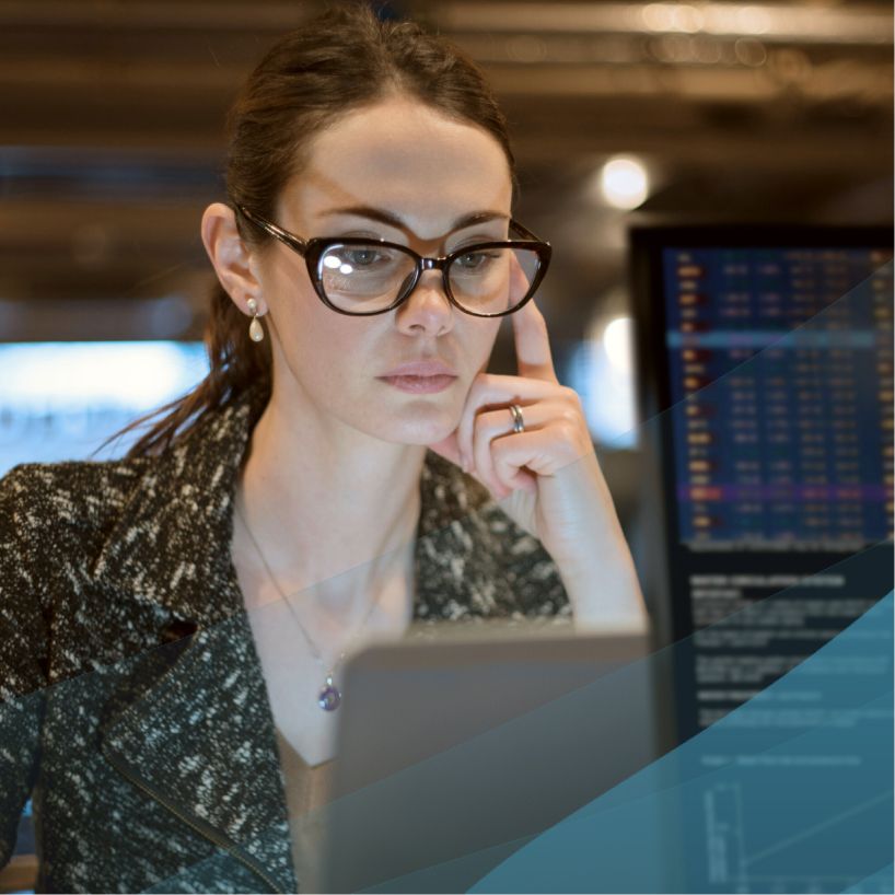 woman studying her laptop in the office