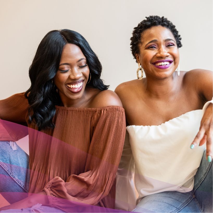 Two female health coaches smiling
