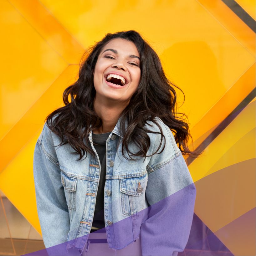 Happy young female student smiling