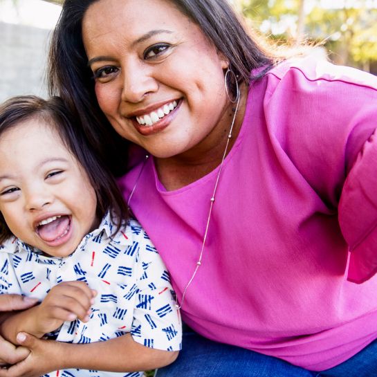 mother and child smiling