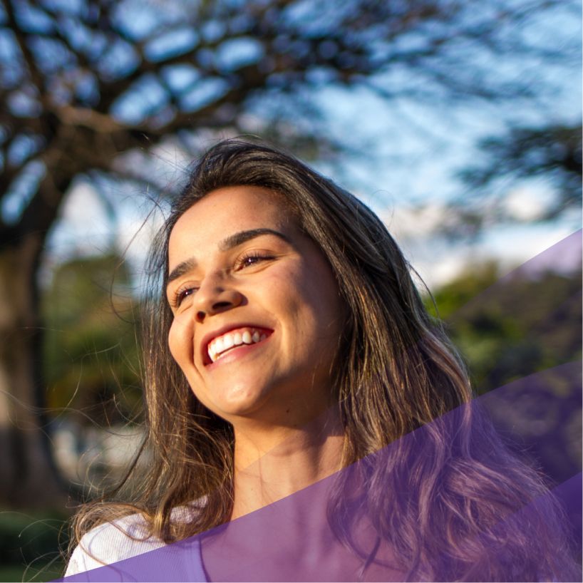 woman smiles in the sun